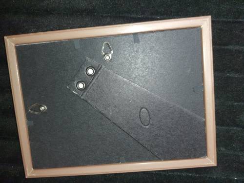 A COLLECTION OF PICTURE FRAMES SOLD AS IS
