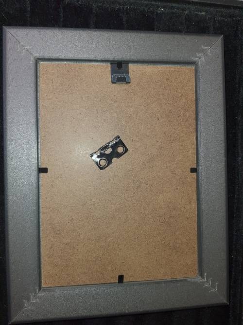 A COLLECTION OF PICTURE FRAMES SOLD AS IS