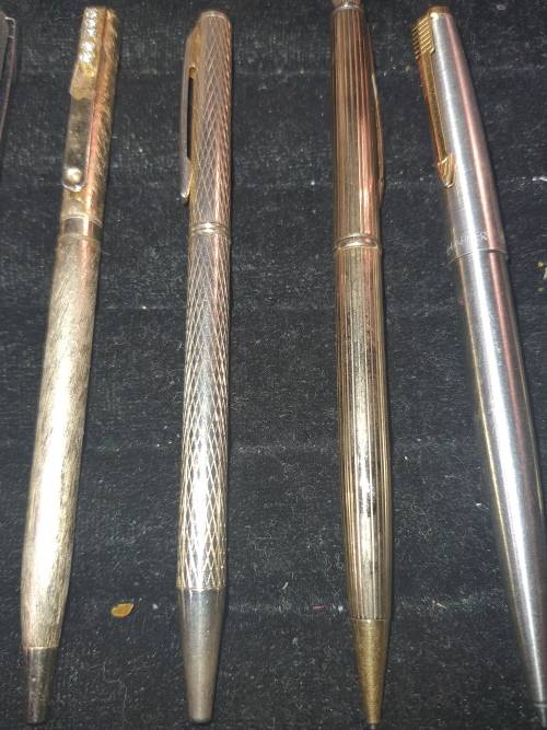 A COLLECTION OF GOLD PLATED PENS AND PENCILS FOR THE COLLECTORS SOLD AS IS