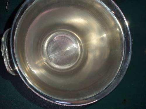 TWO VINTAGE STAINLESS STEEL ICE BUCKETS AND AN ICE TONG SOLD AS IS