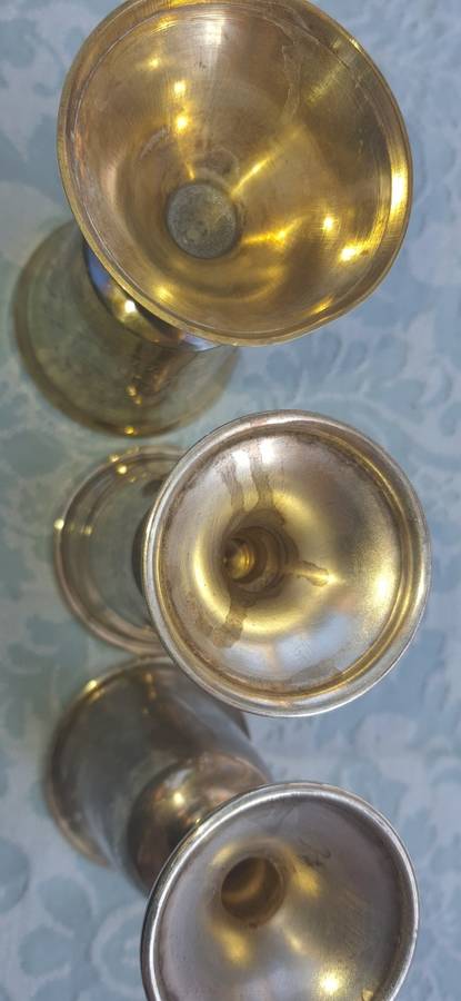 A COLLECTION OF JEWISH WINE SILVER PLATED INGOTS SOLD AS IS