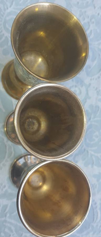 A COLLECTION OF JEWISH WINE SILVER PLATED INGOTS SOLD AS IS