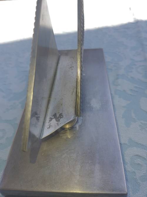 A VINTAGE STAINLESS STEEL SERVIETTE HOLDER
