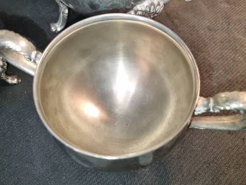A VINTAGE SILVER-PLATED VICTORIAN STYLE TEA JUG, MILK AND SUGAR BOWL SET SOLD AS IS