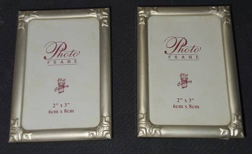 TWO VIRTUALLY BRAND-NEW SMALL PICTURE FRAMES SOLD AS IS