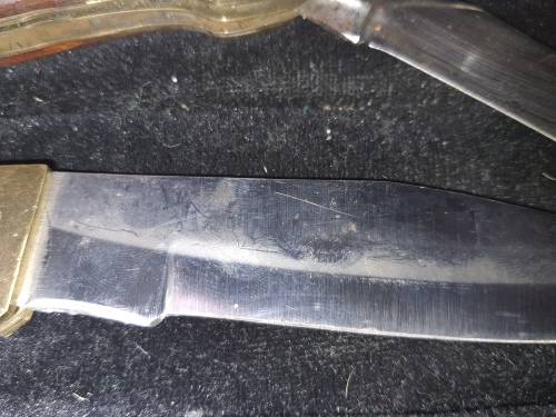 A VINTAGE JOBLOT POCKET KNIVES AND BOTTLE OPENERS SOLD AS IS