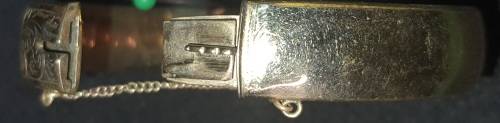 A vintage 9ct gold core bangle 21.8 grs ornately engraved, i