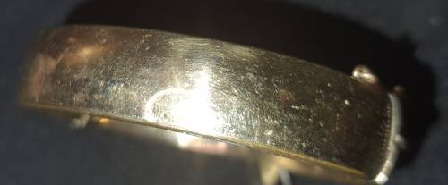 A vintage 9ct gold core bangle 21.8 grs ornately engraved, i