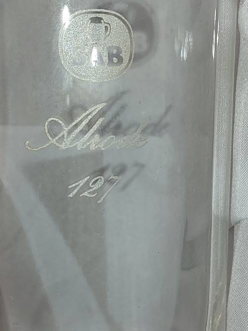 A pair of commemorative SAB beer glasses sold as is.