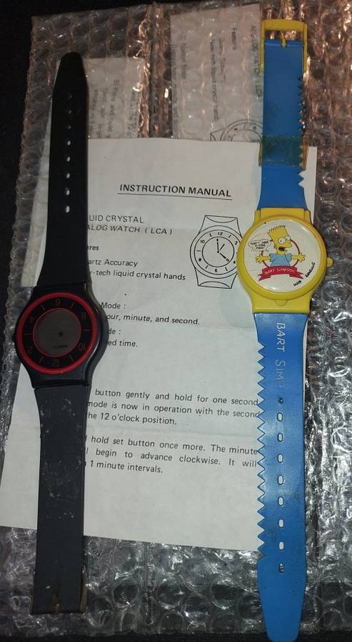TWO RARE HIGHLY COLLECTABLE QUARTZ BART SIMSON WATCHES SOLD AS IS NOT TESTED