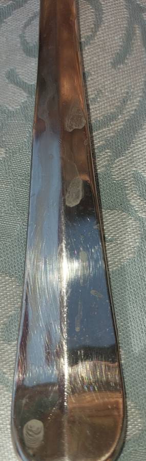 A CLASSIC DESIGNED PAIR OF SALAD TONGS SOLD AS IS
