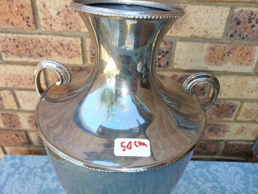 A VINTAGE SILVERPLATED 50-CENTIMETER HIGH ROMAN-STYLE VASE