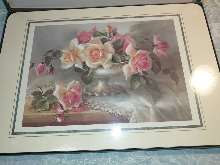 A COLLECTION OF 16 JAYSON RISE TO THE OCCASION PLACEMATS