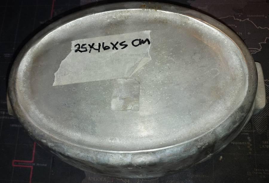 A MIDSIZE CASSEROLE STYLE ALUMINIUM ALLOY SERVING DISH SOLD AS IS