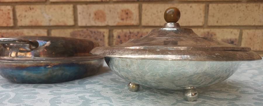 A COLLECTION OF ANTIQUE SILVER PLATED TURINES AND A SERVING TRAY