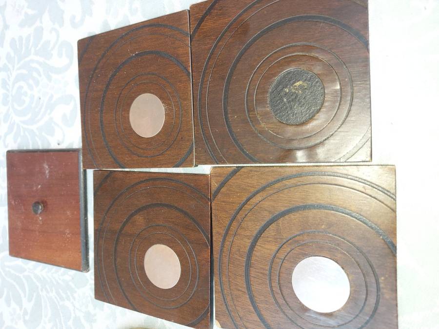 A COLLECTION OF COASTERS FOR THE BAR