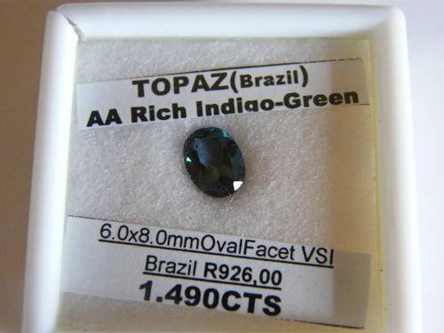 A 1.490cts OVAL FACET, AA RICH INDIGO GREEN, BRAZIL, TOPAZ!!!  WITH CERTIFICATE!!!