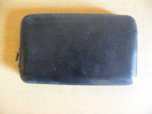 A VERY OLD LEATHER WALLET IN ALMOST PERFECT CONDITION.HAS RHE NAME SPRINGBOK IN THE LEATHER.