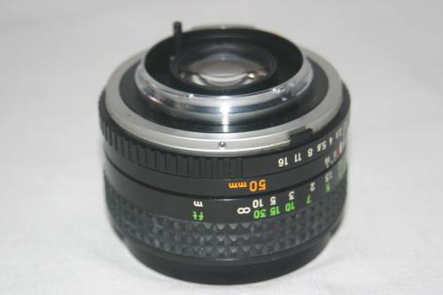 MINOLTA  MC  ROKKOR - PF  1:1.7  f= 50mm  FILM CAMERA LENSE.