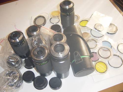 ASSORTED LOT OF FILM CAMERA LENSES AND LENSE FILTERS (AS YOU SEE THEM BELOW)