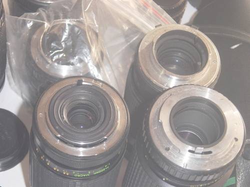 ASSORTED LOT OF FILM CAMERA LENSES AND LENSE FILTERS (AS YOU SEE THEM BELOW)