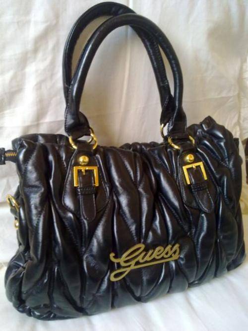 Beautiful black & gold Guess handbag