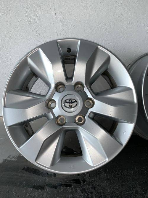 4 x ORIGINAL 17`` Hilux Mags (including 24 wheel studs)