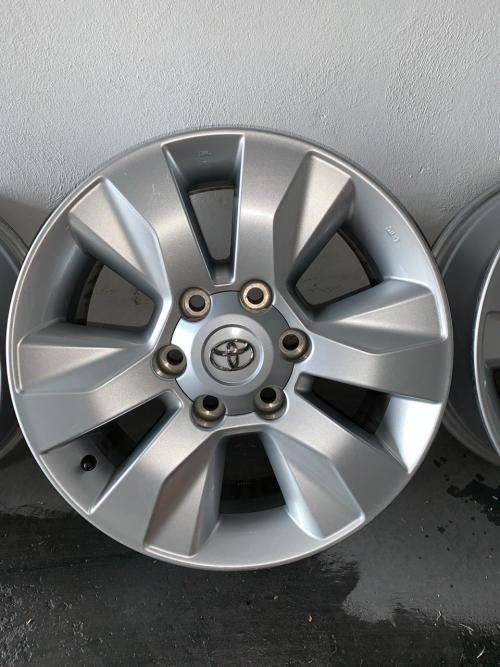 4 x ORIGINAL 17`` Hilux Mags (including 24 wheel studs)