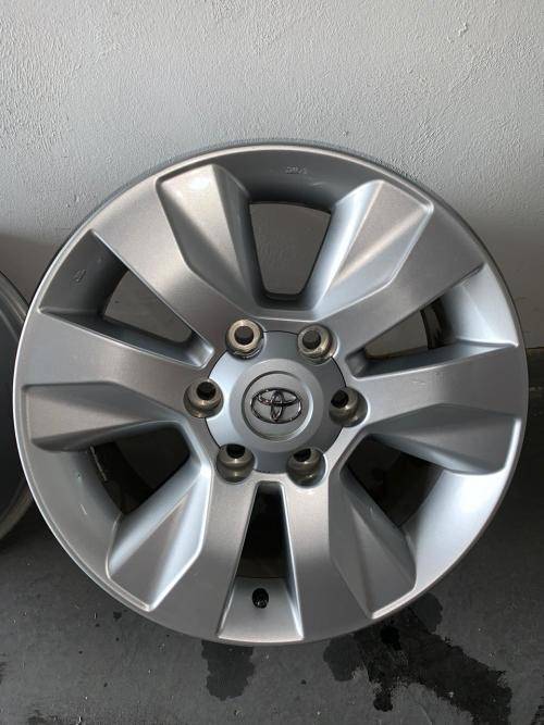 4 x ORIGINAL 17`` Hilux Mags (including 24 wheel studs)