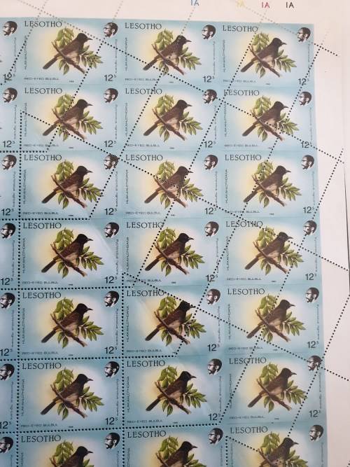 Lesotho 1988 Bird 12s sheet of 60 with spectacular top right fold over resulting in diagonal perf