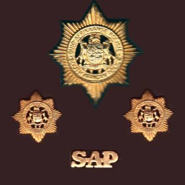 Old S.A.P. Cap and Collar Badges with Title Insignia.