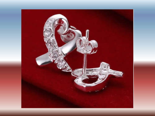 DAINTY HEART SHAPE DIAMOND SIMULANTS SET IN .925 STERLING SILVER