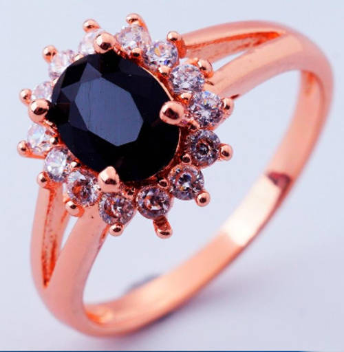 8x6 mm (2.6gr.) Imported Black Onyx Surrounded by white Diamonds Ring (Size 7)