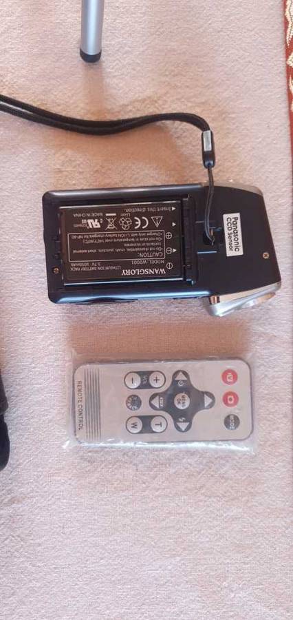 Video camera with Tripod and remote