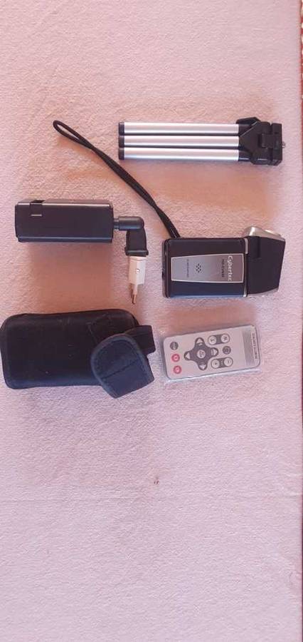 Video camera with Tripod and remote