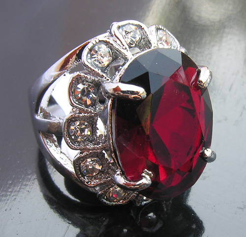 Magnificent 18KGP Dress Ring with Huge Oval Red Stone.