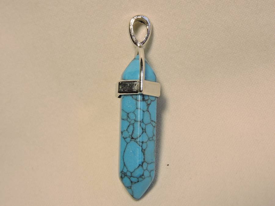 Contemporary Turquoise pendant ( crystal cut blue stone pendant).