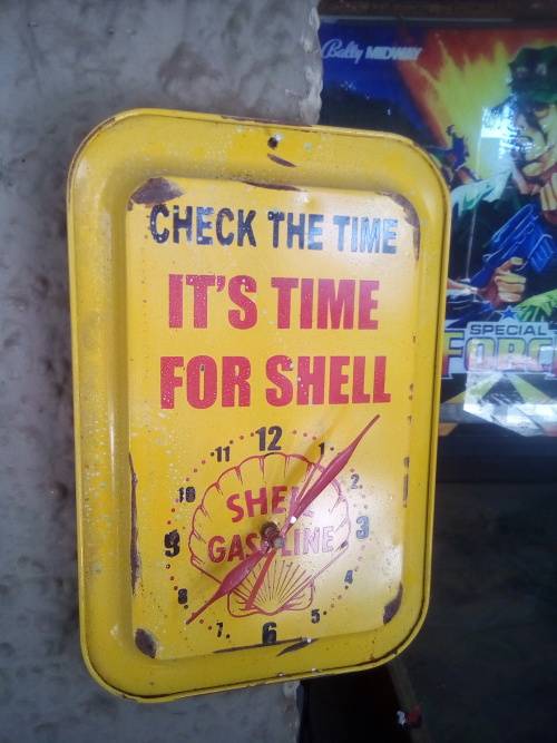 shell...time for shell metal clock