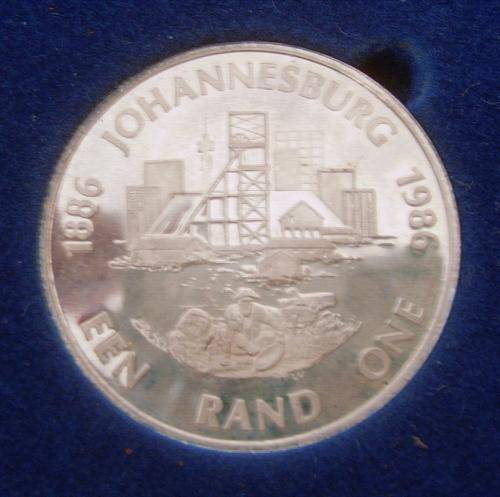 1986 JOHANNESBURG 100 YEARS .999 PROOF SILVER R1 COIN