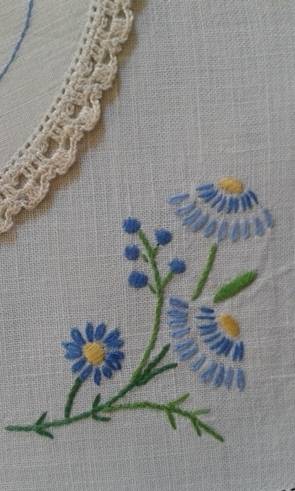 Two vintage linen embroidered doilies