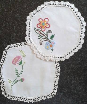 Two lovely vintage embroidered linen doilies 20cm square