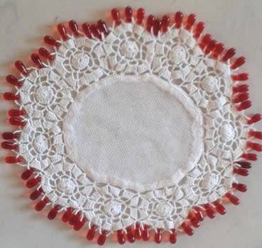 Red glass teardrop beaded doilie net centre