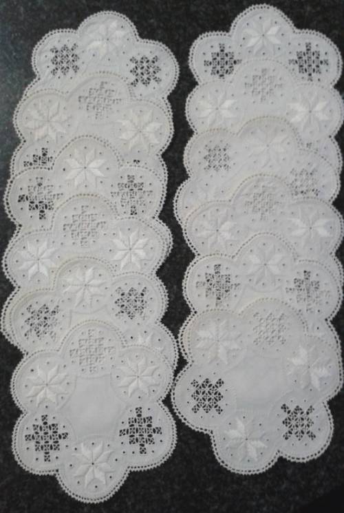Two dozen round vintage linen Lefkara lace doilies/table mats