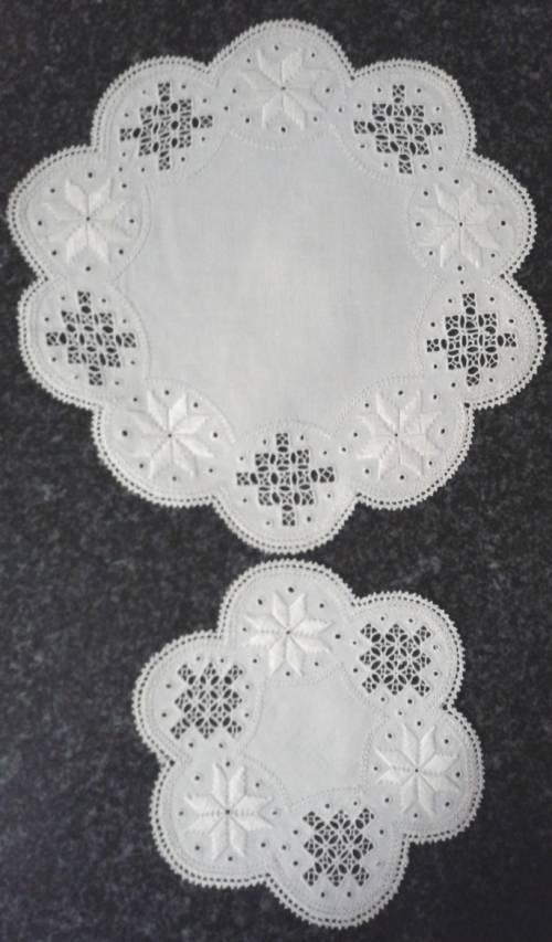 Two dozen round vintage linen Lefkara lace doilies/table mats