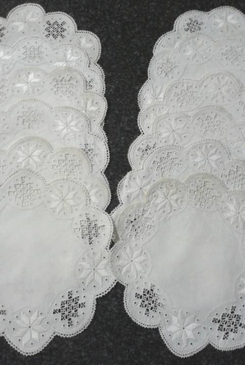 Two dozen round vintage linen Lefkara lace doilies/table mats