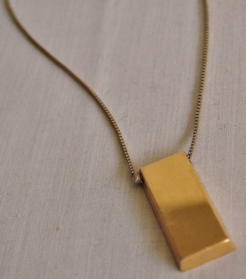 The Gold Bullion Collection 22 carat gold plated bar pendant and chain designed by Royston Lamond