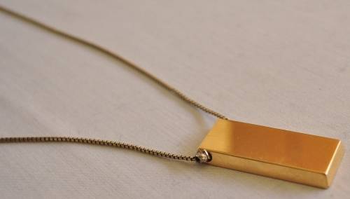 The Gold Bullion Collection 22 carat gold plated bar pendant and chain designed by Royston Lamond