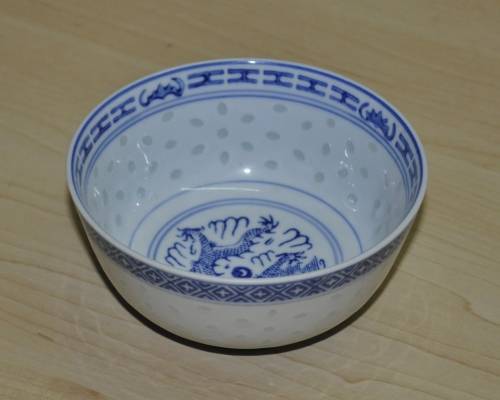 Vintage Chinese Porcelain Translucent Rice Grain Blue and White Dragon Bowl
