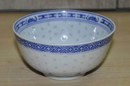 Vintage Chinese Porcelain Translucent Rice Grain Blue and White Dragon Bowl