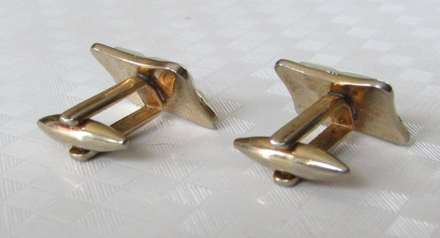 Vintage gilt cufflinks with mother of pearl decoration signed Gilda Stratton